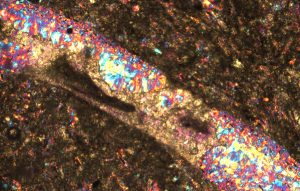 Microscopic photo of rock thin section under cross polarized light