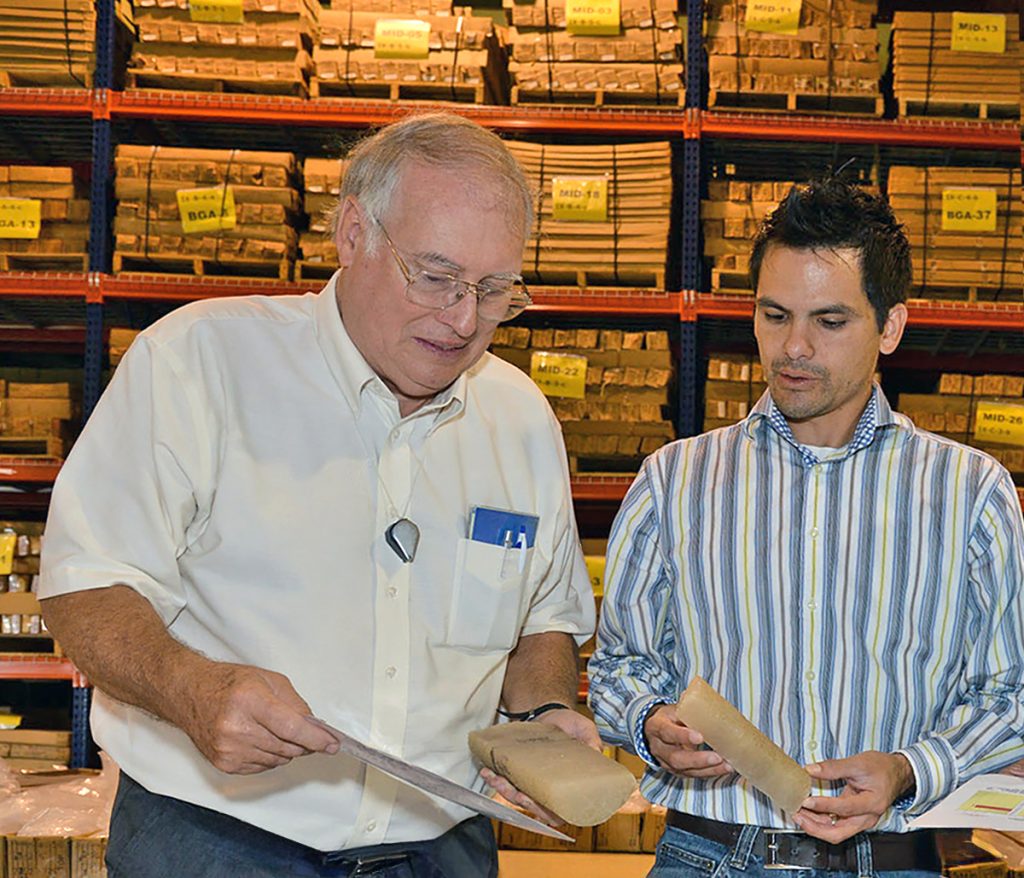 Bill Harrison (left) with Ted Pagano (right) examine potash cores