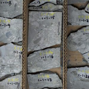 Top down view of rock core cut in half laid on its side from the MGRRE collections.